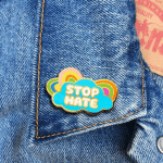 stop hate enamel pin